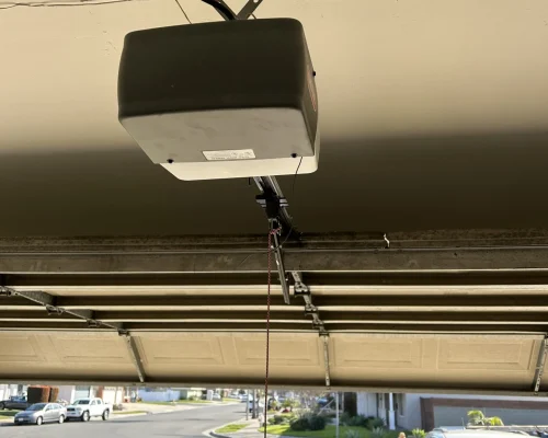 a garage door opener from the ceiling